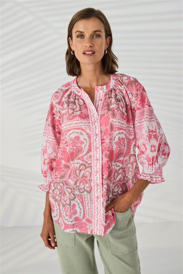 Embrace laid‑back elegance with the Cotto Shirt, crafted from printed cotton in a relaxed silhouette. A bordered print runs down the centre‑front placket, while 3/4 sleeves with elasticated cuffs add effortless versatility to this easy, refined wardrobe staple.